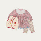 Happyology Lucky Bag, three autumn winter sample pieces laid out - embroidered dress, knitted vest and floral trousers